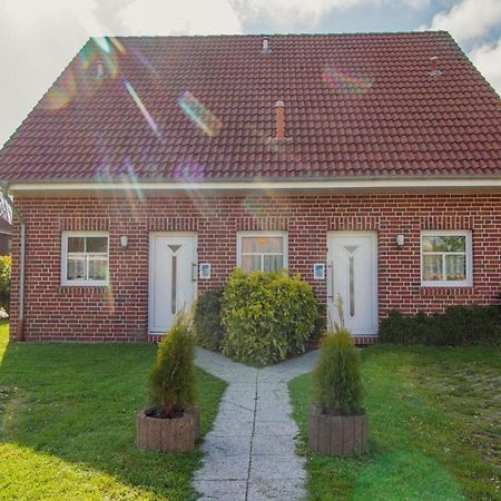 Haus Leuchtturm - Ebbe Lägenhet Krummhörn Exteriör bild