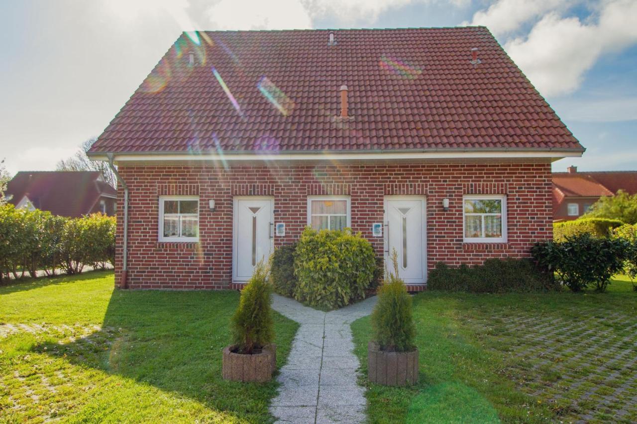 Haus Leuchtturm - Ebbe Lägenhet Krummhörn Exteriör bild